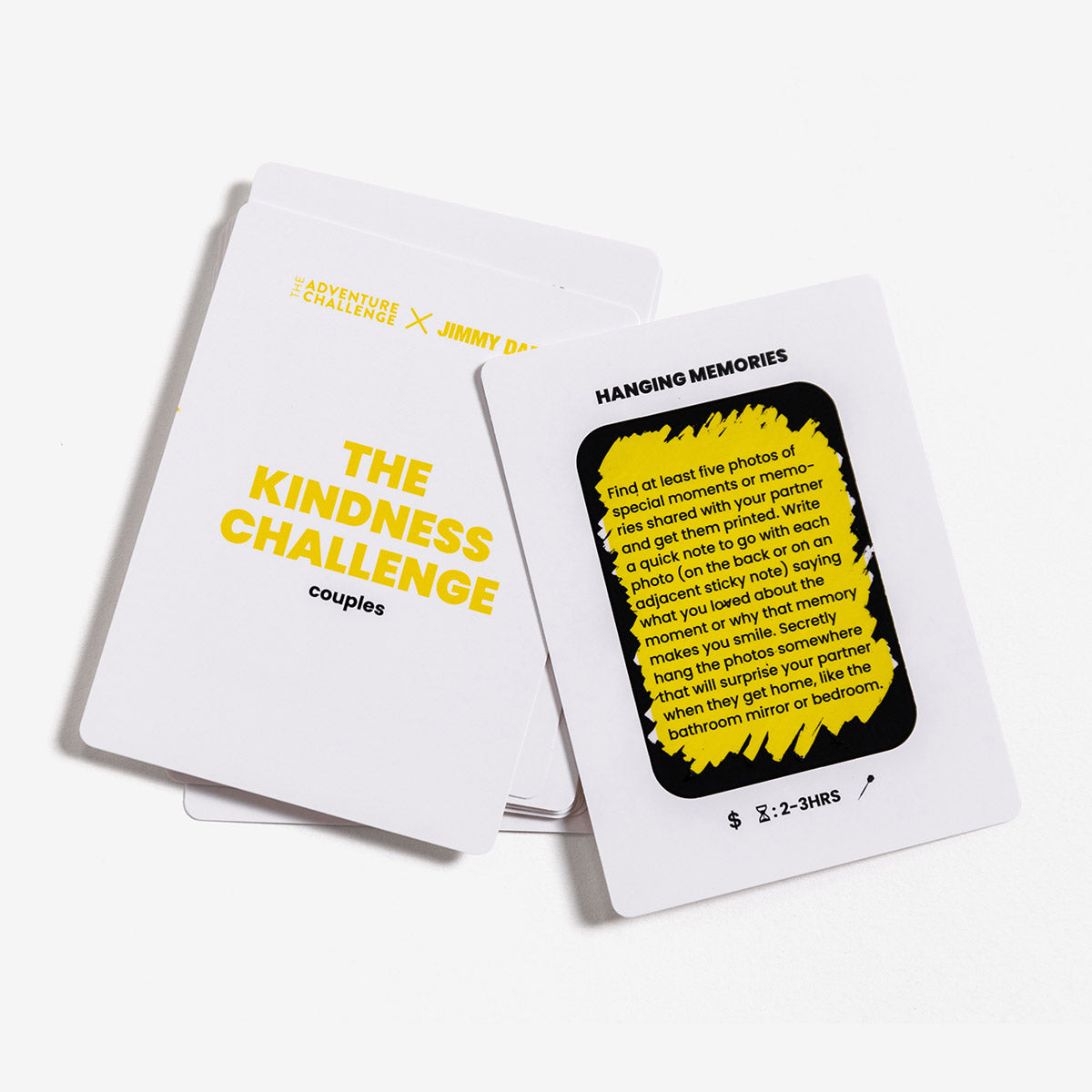 The Kindness Challenge: Couples Expanion pack from Jimmy Darts and The Adventure Challenge is 12 scratch-off challenges to help you surprise your partner with thoughtful gestures. Example challenge scratched off called "Hanging Memories."