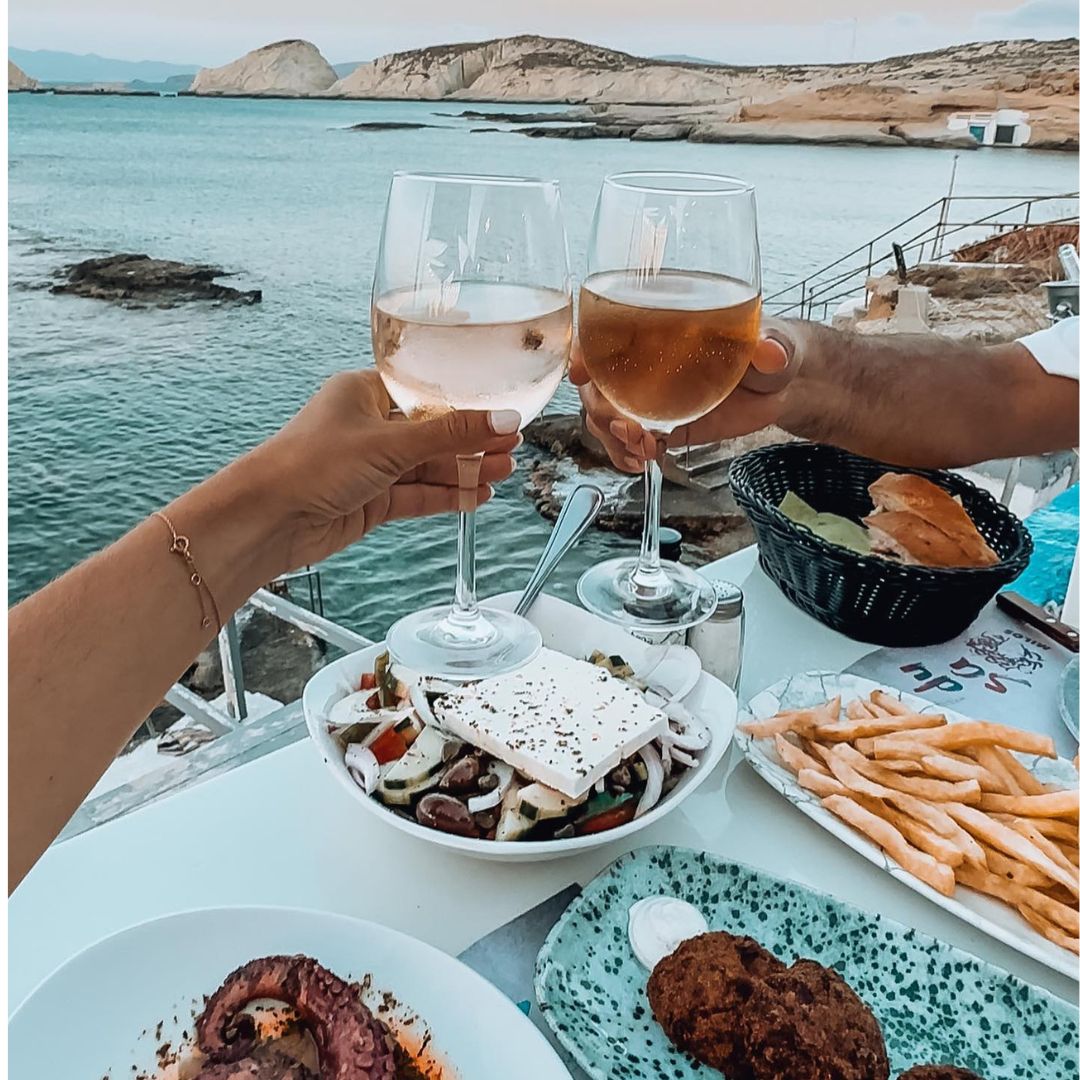 Cheers to your new adventures and meals like this when you use the Travel Edition! Exotic meal pictured including french fries, cheese, and octopus.